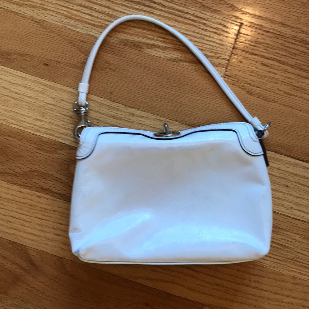 White wristlet.  Great for night out.